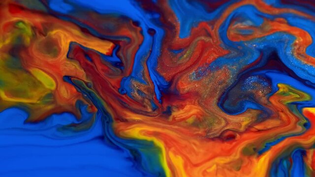 Colorful background in Gold dust blue and red paint flow on universe colors surface mix patterns. macro