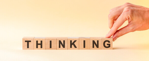 woman made word thinking with wood blocks