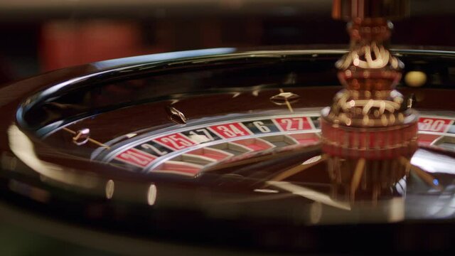Close-up of roulette wheel in casino