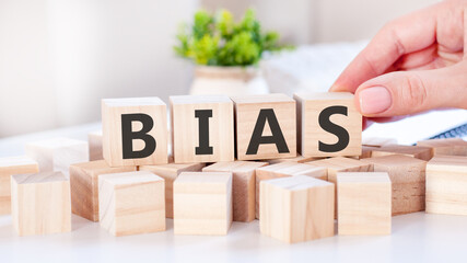 word bias on the wooden blocks on table, business concept