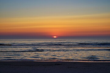 Fototapeta na wymiar sunset on Henne beach, Jutland, Denmark