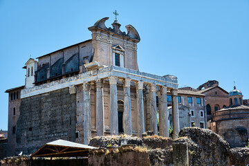 Fototapeta na wymiar View of the temple of Antoninus and Faustina at the Roman Forum in Rome.
