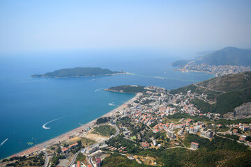 Fototapeta na wymiar Paragliding in Montenegro in Budva. View on the city and sea summer travel