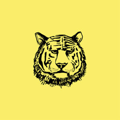 Angry Tiger Face. Black paint, ink brush strokes, brushes, lines, grunge. Freehand drawing. Tiger drawn with ink from the hands of a predator logo. Vector illustration. Isolated on yellow background.