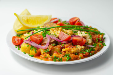 Haricot tomato bean sauce with turmeric potatoes, pork and herb sausage, and scrambled egg