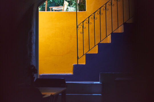 Interior Scene Shot Through A Key Hole Of A Blue Staircase