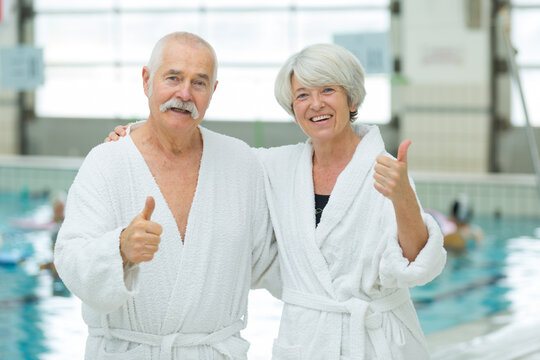couple enjoying near swimming pool