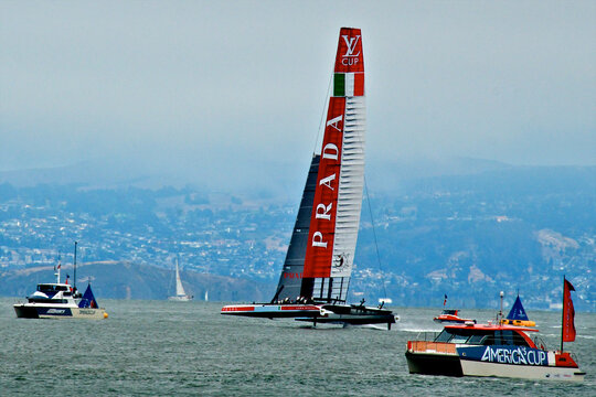 “Prada Challenge” foiling on daggerboards in the Challenger Series, Louis Vuitton Cup in spring 2013, San Francisco Bay, California 