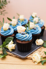 Delicious cupcakes. Dessert muffins on a table.