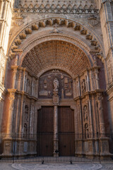 Fototapeta premium Beautiful view of the entrance of the cathedral Basilica de Santa Maria in Palma de Mallorca, Spain (Vertical)