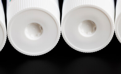 closed white plastic tube