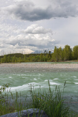 North Fork Flathead River with Glacier National Park mountain range in background, Montana, USA