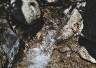 Mountain Climb: Water Flowing into Rocks 