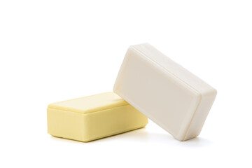yellow and white soap bars isolated on white background. antibacterial soap bricks cut out