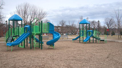 Abandoned playground in Victoria Park on a cloudy day, during the covid 19 pandemic.
