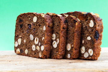 oval loaf of rye bread with hazelnuts and dried fruit