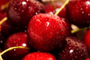 delicious sweet cherries covered with water droplets
