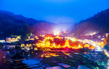 Fototapeta na wymiar Night view of Dong Village in Zhaoxing, Guizhou, China