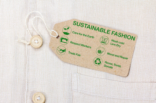 sustainable fashion label with care for the earth, respect for workers, trade fair, wash cold, line dry, mend and repair, reuse, swap or donate with icons.
