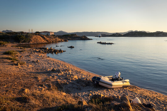 At the end of a day touring the coasts of Caprera, Cala Andreani beach, La Maddalena, Sardinia, Italy
