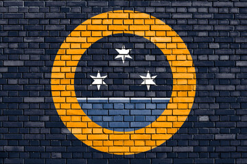 flag of Rochester painted on brick wall