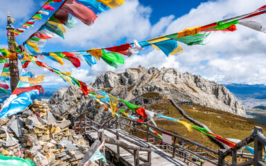 Shika snow mountain summit and Tibetan Buddhist prayer flags view Shangri-La Yunnan China