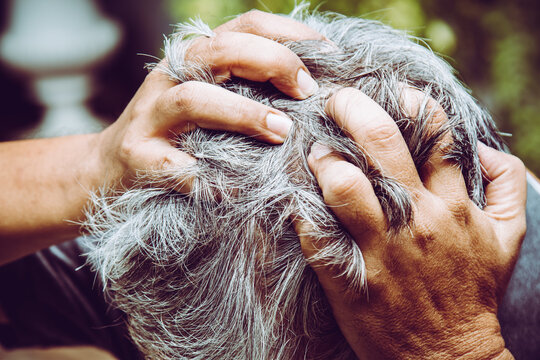 Close Up Of Old Man Feel Headache While Depressed From Work