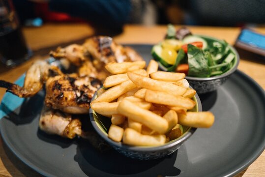 Close-up Of Fast Food In Plate On Table