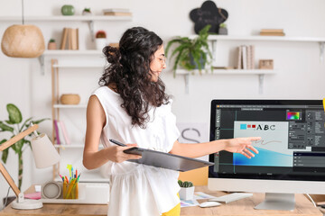 Graphic designer working in office