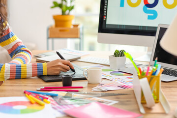 Graphic designer working in office