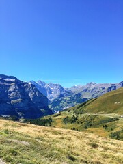 Fototapeta premium Panoramic view of the Swiss Alps on a clear summer day