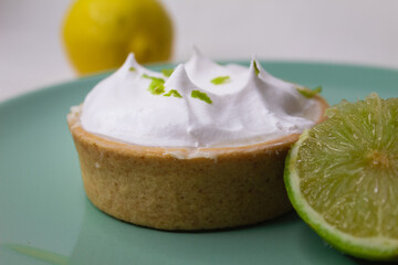 Lemon pie in a green dish