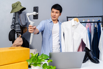 man selling clothes and accessories online by smartphone live streaming, business online e-commerce...