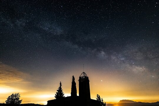 Milky Way Viene From The Mountain With A Church