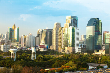 Bangkok Cityscape, Business district with Park in the City at dusk