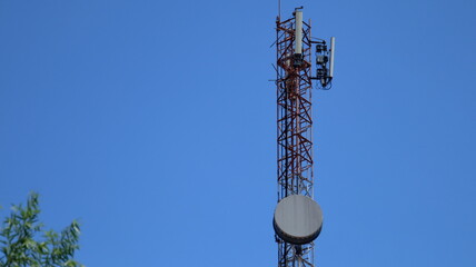 Mobile phone Telecommunication Radio antenna Tower. Cell phone tower with blue sky background
