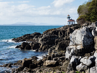 Fototapeta na wymiar Lighthouse at Lime Kiln Point State Park on San Juan Island - WA, USA