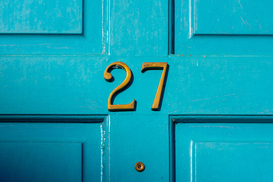 House Number 27 On A Blue Wooden Front Door In London