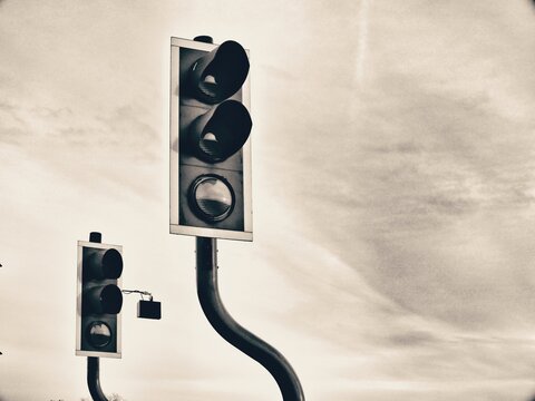 Low Angle View Of Traffic Light Against Sky