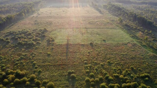 4k drone forward video (Ultra High Definition). Exciting view from flying drone of Luky lake. Unbelievable summer sunrise on Shatsky National Park,  Volyn region, Ukraine, Europe.