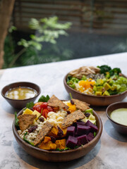 Cafe - Salad bowl with variety of vegetable, beans, salad cream