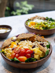Cafe - Salad bowl with variety of vegetable, beans, salad cream
