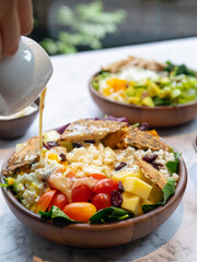 Cafe - Salad bowl with variety of vegetable, beans, salad cream