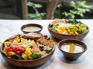 Cafe - Salad bowl with variety of vegetable, beans, salad cream