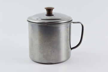 Silver steel mug over white background.