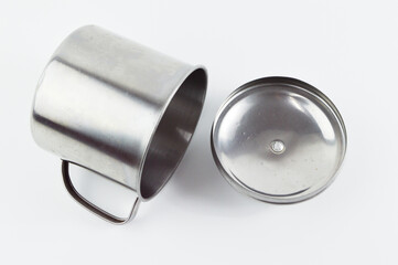 Silver steel mug over white background
