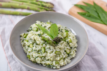 Spring food; Delicious risotto with asparagus and wild garlic