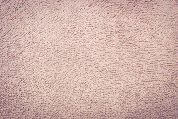 Purple bathroom towel as background texture. Place for text