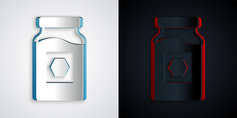 Paper cut Jar of honey icon isolated on grey and black background. Food bank. Sweet natural food symbol. Paper art style. Vector