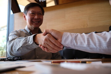 Fototapeta premium Image business mans handshake. Business partnership meeting concept.